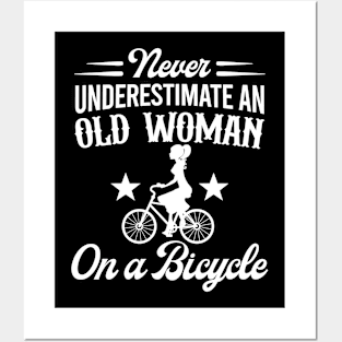 Never Underestimate An Old Woman On A Bicycle Posters and Art